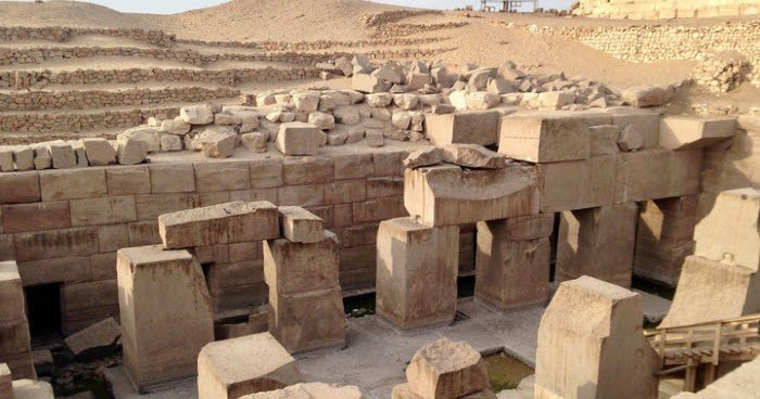The ruins of the Temple of Osiris at Abydos, with its ancient Egyptian architecture and carvings